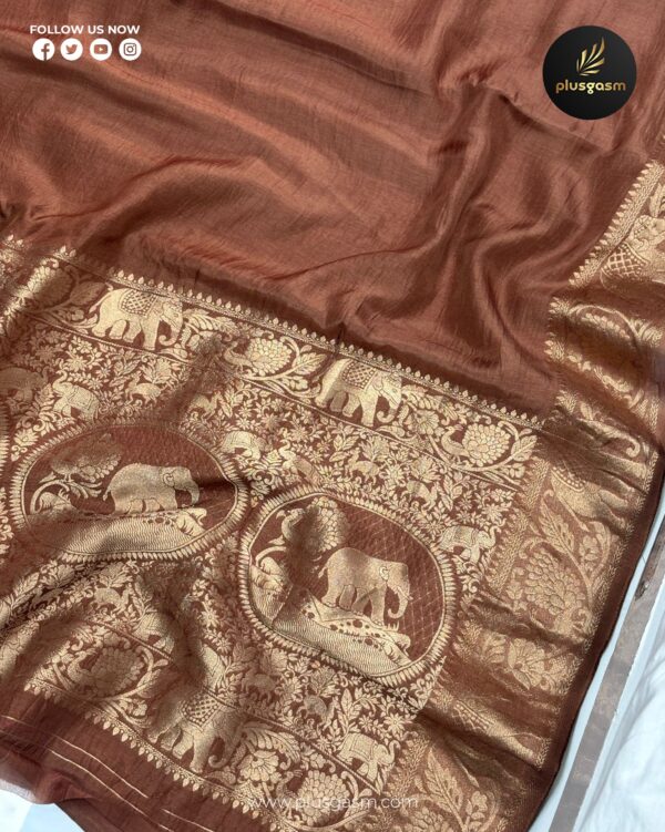 Brown silk saree with gold zari elephant motifs and intricate traditional border design